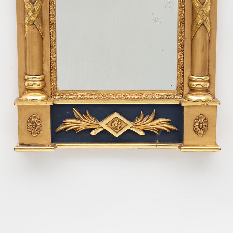 A Swedish Empire mirror, first half of the 19th Century.