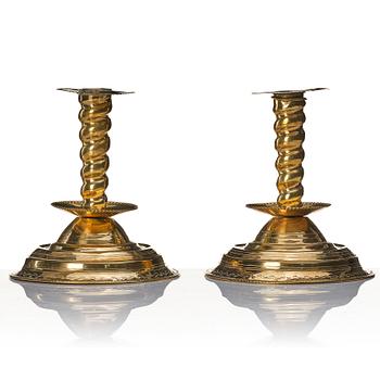 A pair of late Baroque candlesticks.