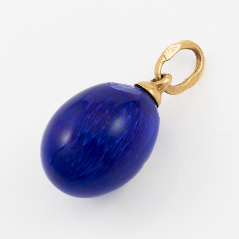 A W.A. Bolin pendant in the form of an egg, 18K gold and silver with enamel, set with round brilliant-cut diamonds.