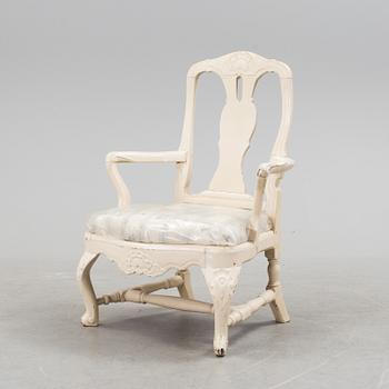 An early 18th century rococo chair.