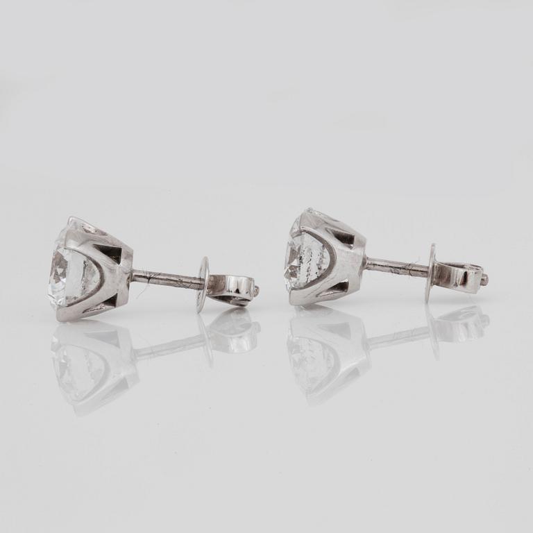 A pair of diamond stud earrings. Total carat weight circa 4.00 ct. Quality approximately F-G/SI.