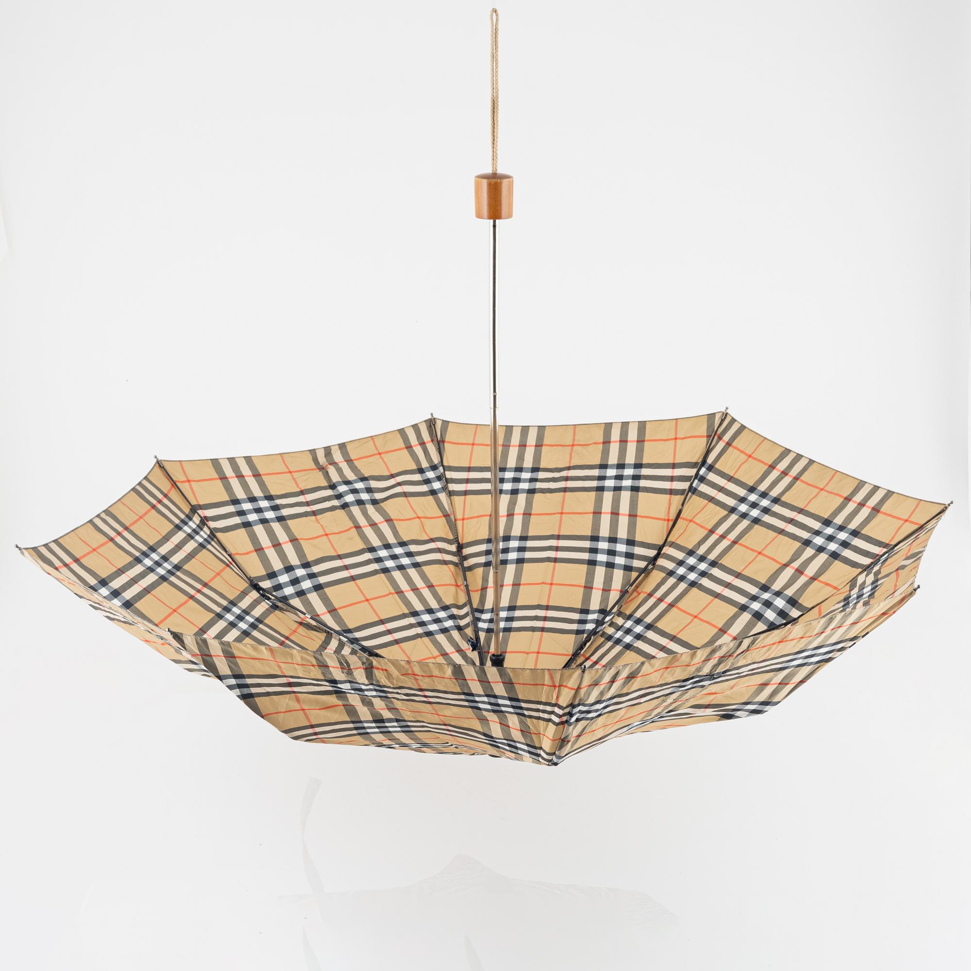 Burberry, an umbrella.