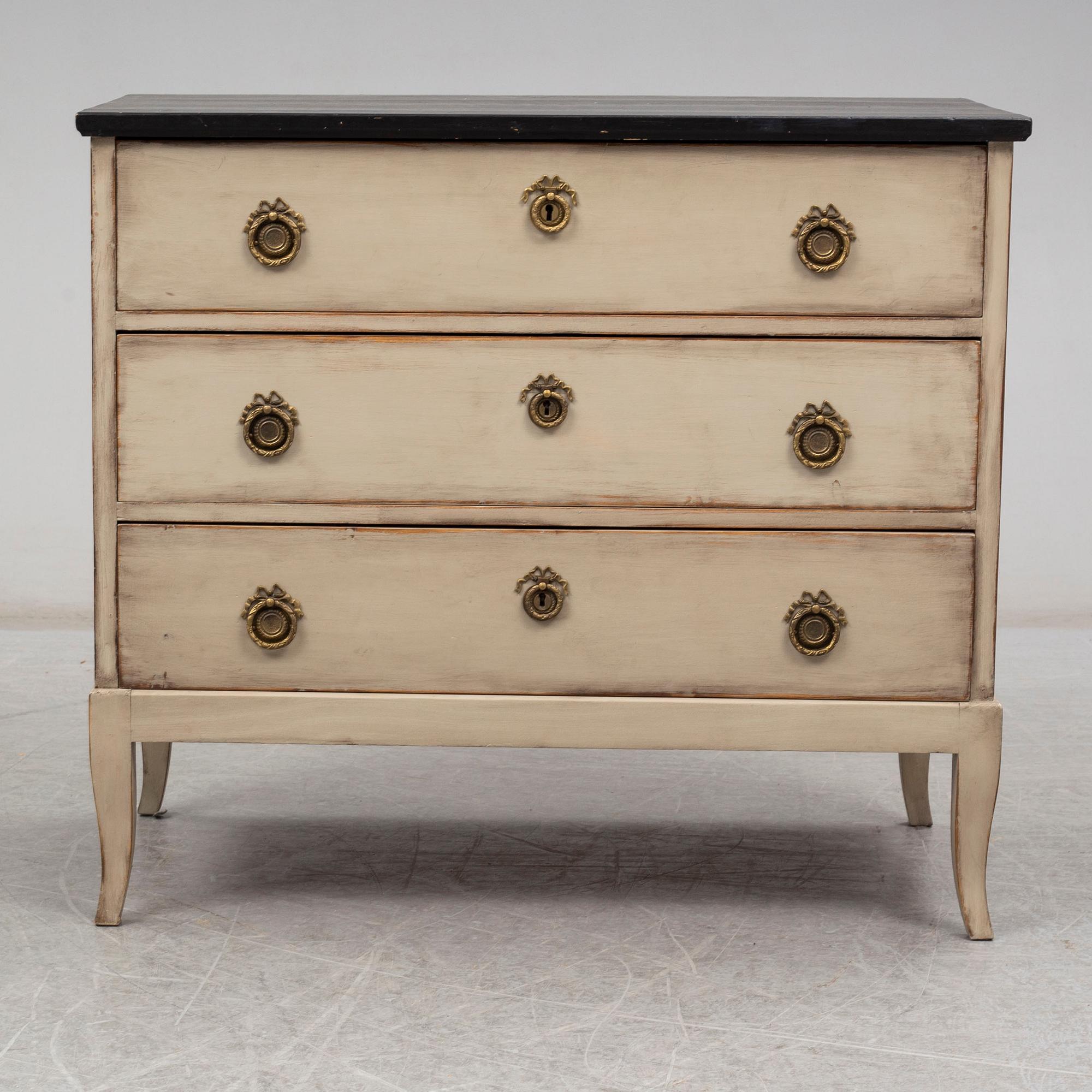 An early 20th century painted chest of drawers.