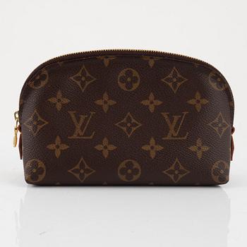 Louis Vuitton, makeup bag and wallet.