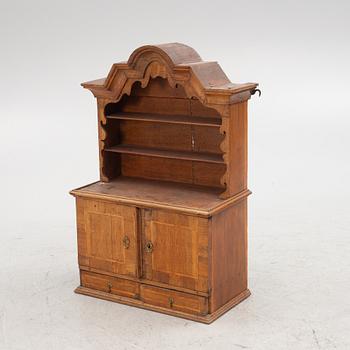 A late-Baroque wall cabinet, first part 18th century.