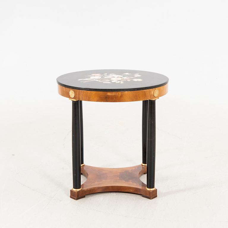 An empire style table with pietradura top around 1900.