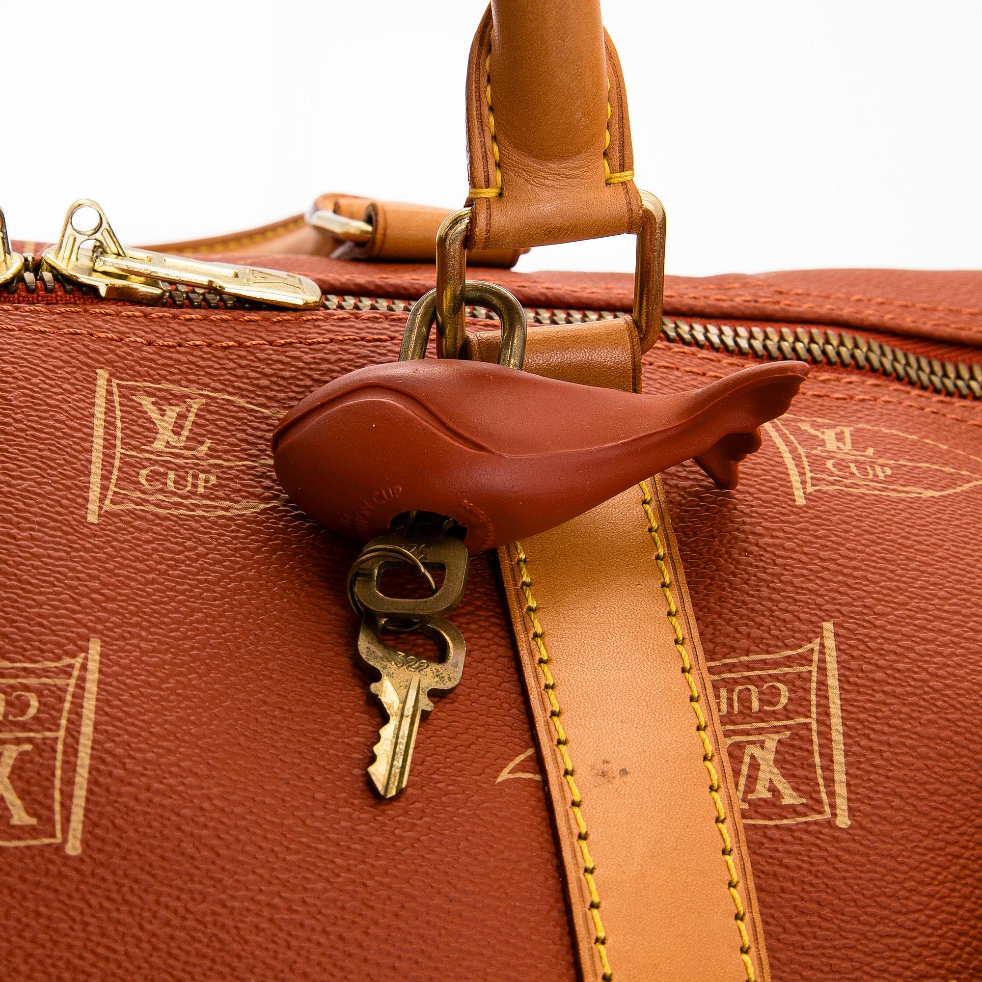 Louis Vuitton, a 'LV America's Cup Canvas Boston Bag' bag.
