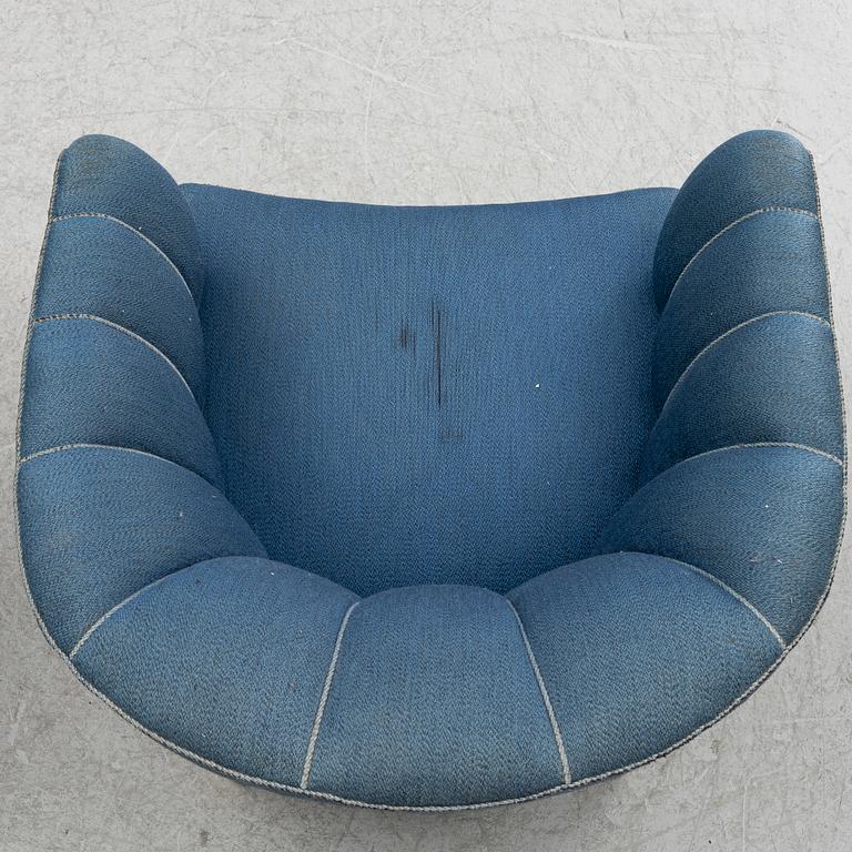 A pair of 1950's armchairs.