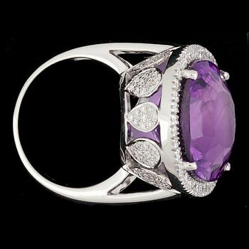 An amethyst, 17.60 cts, and brilliant cut diamond ring, tot. 1.19 cts.