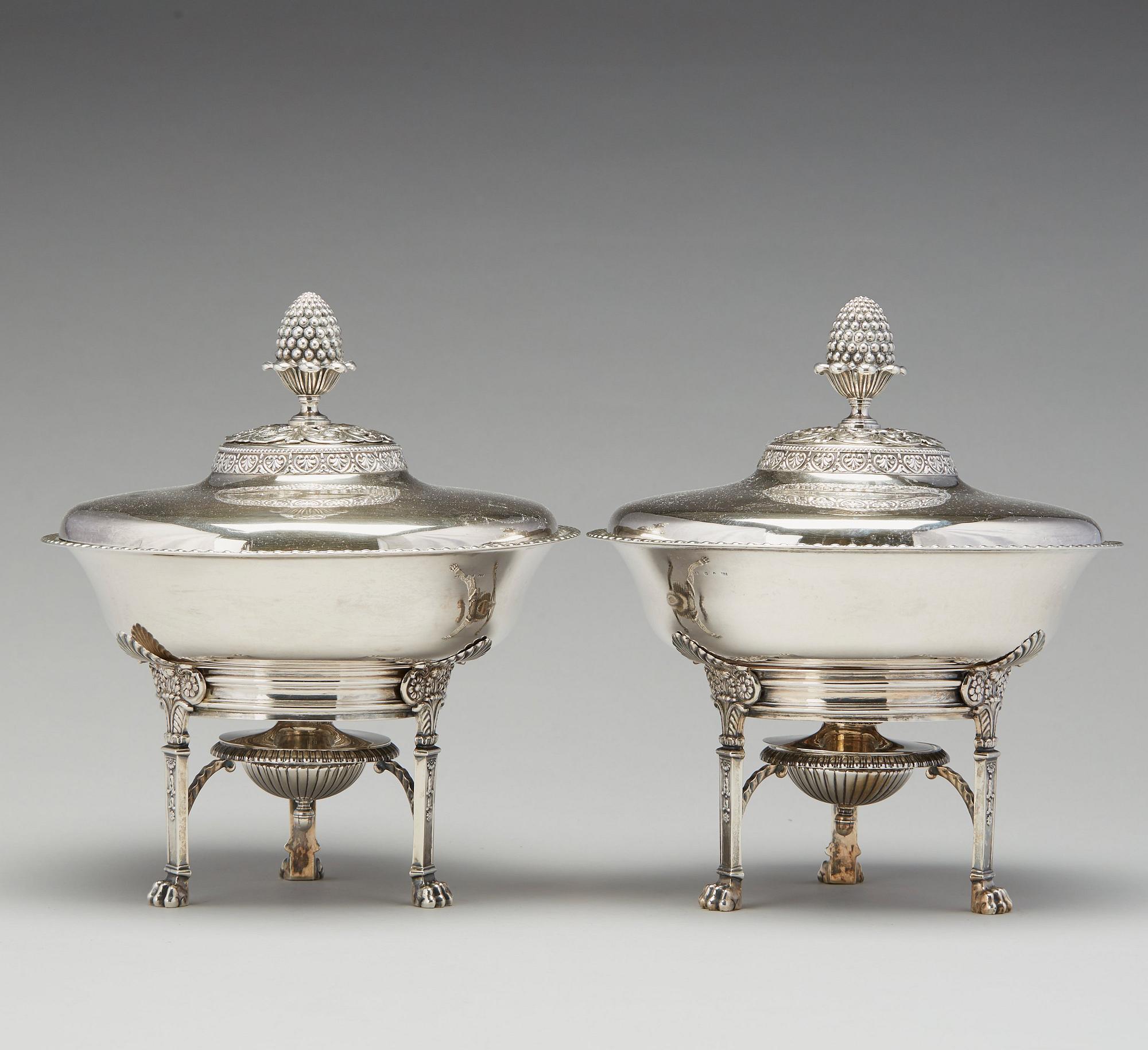 A pair of Swedish Empire silver tureens on stand, mark of Adolf Zethelius, Stockholm 1830.