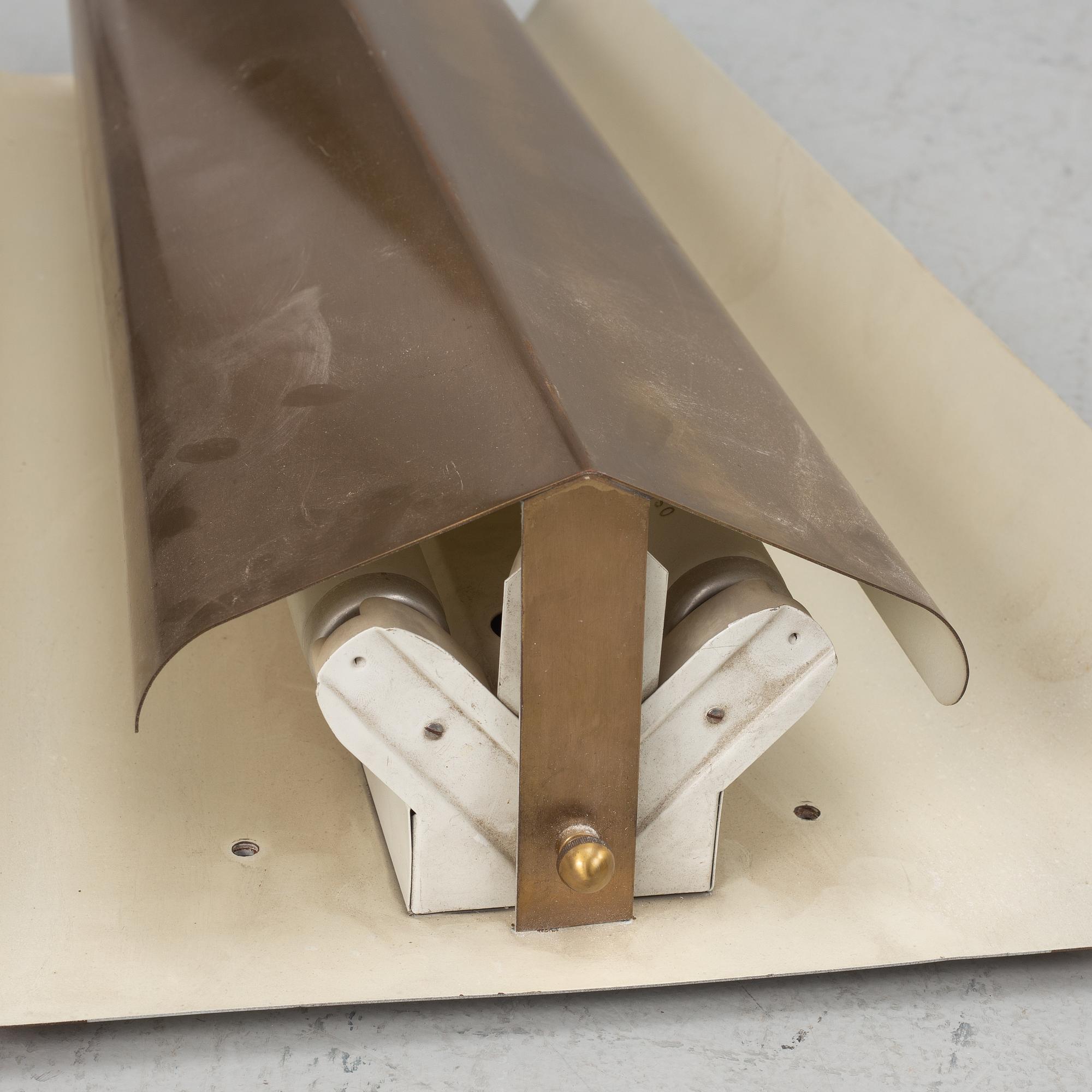 A Swedish Modern brass wall light, 1940's/50's.