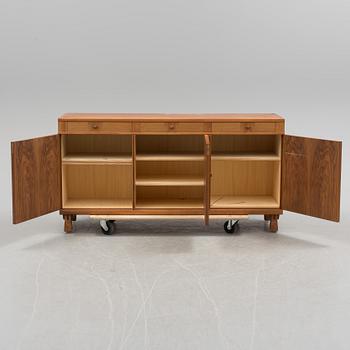 A Swedish second half of the 20th century Carl Malmsten "Ambassadör" sideboard veneered with walnut from Åfors möbler.