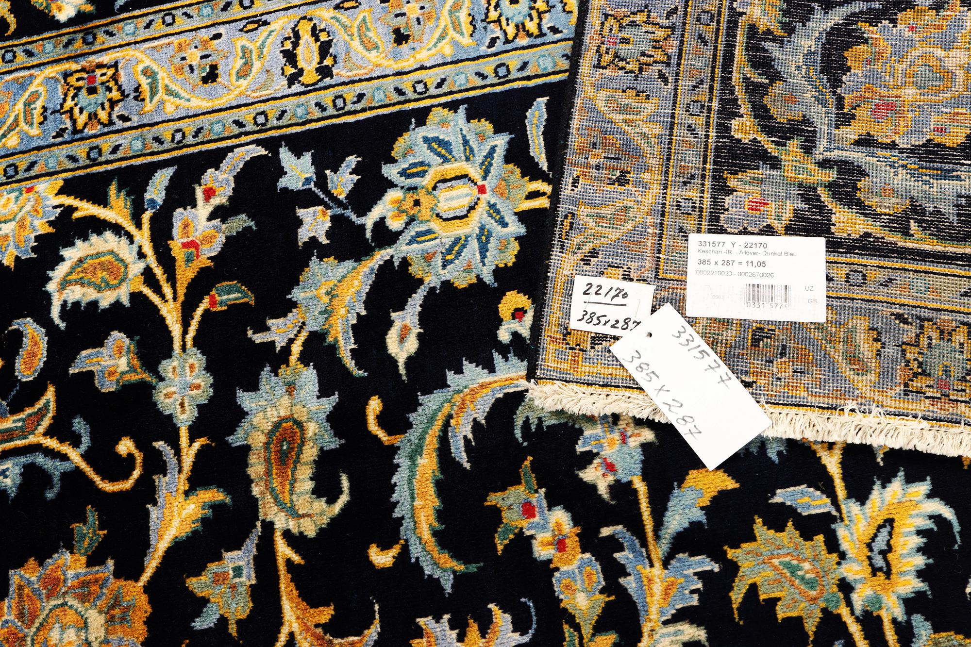 A Kashan carpet, c. 385 x 287 cm.