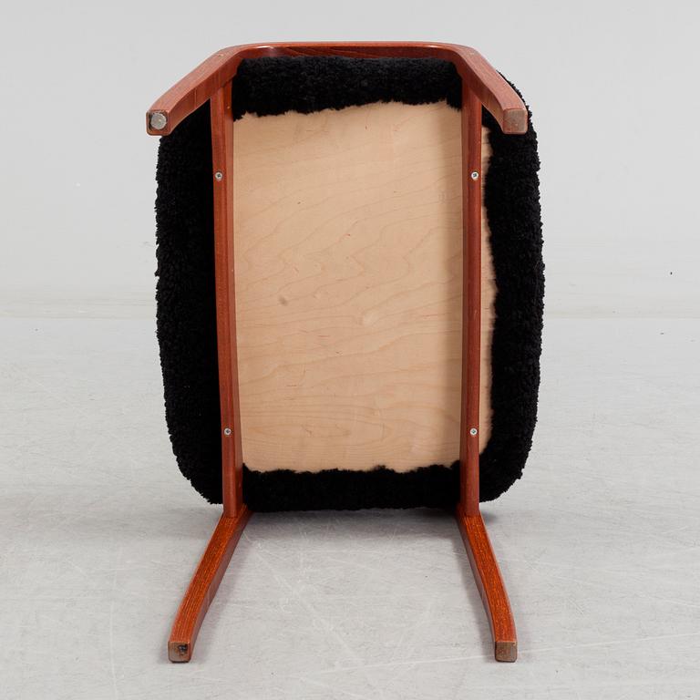 A 'Lamino' foot stool by Yngve Ekström, Swedese.