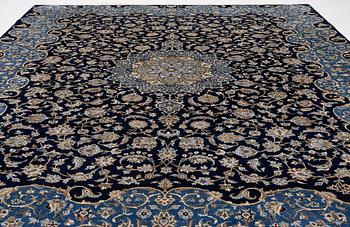 A Royal Keshan carpet, signed, c. 395 x 295 cm.