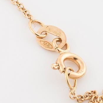 A smokey quartz and citrine pendant.