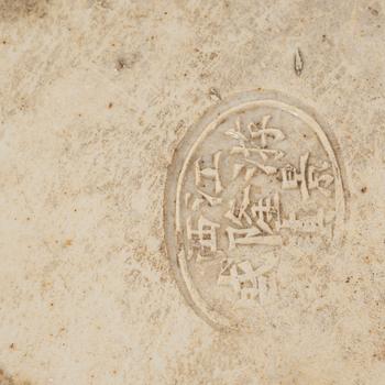 A porcelain 'Budai' figure, China, 20th Century.