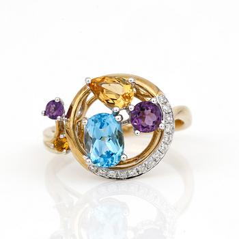 RING, 14K guld med citriner, ametister, blå topas och små diamanter. Vikt ca 3,70 g.