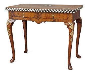 817. A German Rococo card table.