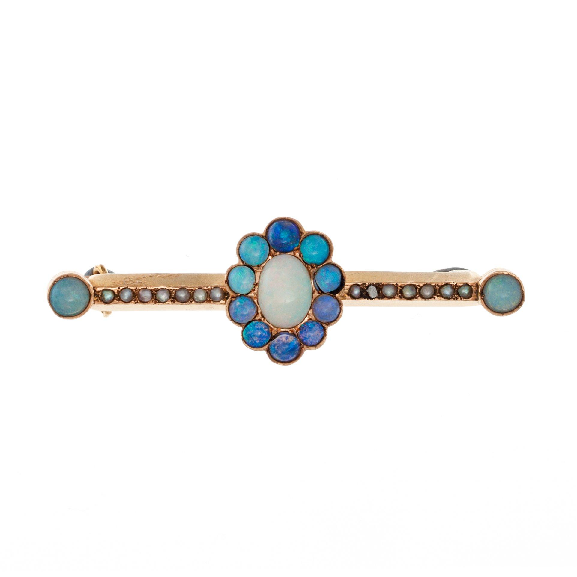 A BROOCH, 56 gold, opals, pearls. Kiril Albrecht St.Petersburg c. 1900. Length 44 mm. Weight4,6 g.