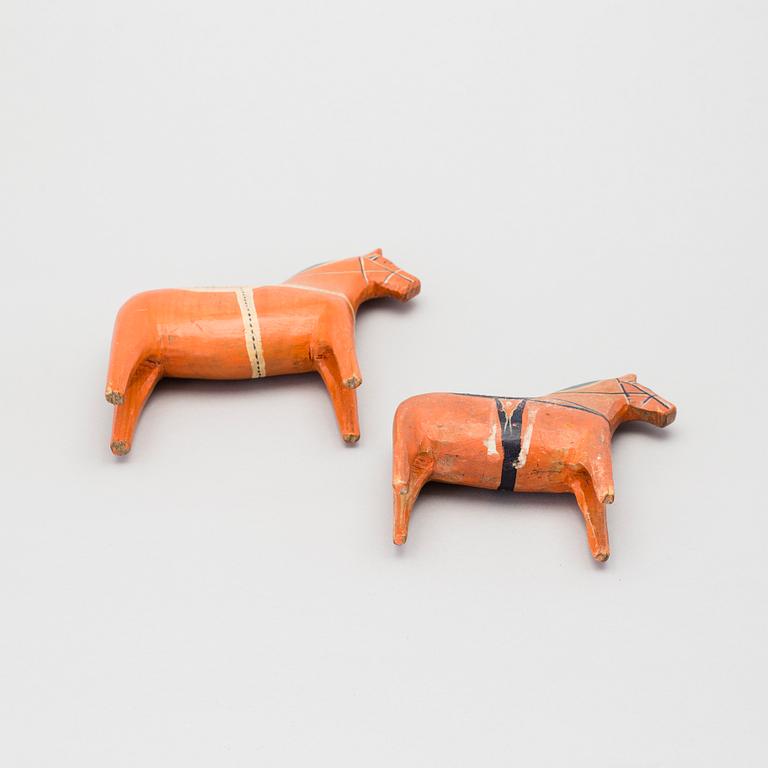 Two painted folk art dala horses first half of the 20th century.