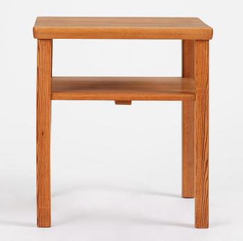 Axel Einar Hjorth, a stained pine "Värmdö" table, Nordiska Kompaniet, Sweden, 1930s.