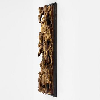 A wooden sculptured wooden panel, late Qing dynasty, 19th Century.