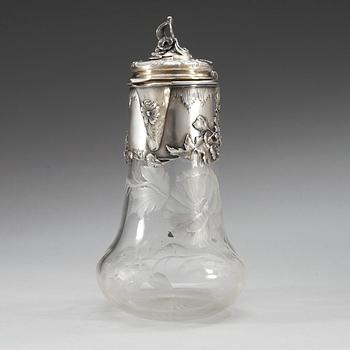 A Russian 20th century glass and parcel- gilt jug.