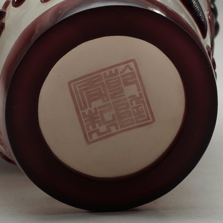 A Chinese purple overlay peking glass vase, 20th Century.