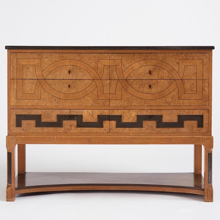 Carl Bergsten, an oak veneered sideboard/ chest of drawers, Nordiska Kompaniet Sweden 1923. Part of a set exhibited in Gothenburg 1923.