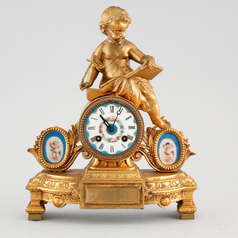 A Louis XVI style table clock, around the year 1900.