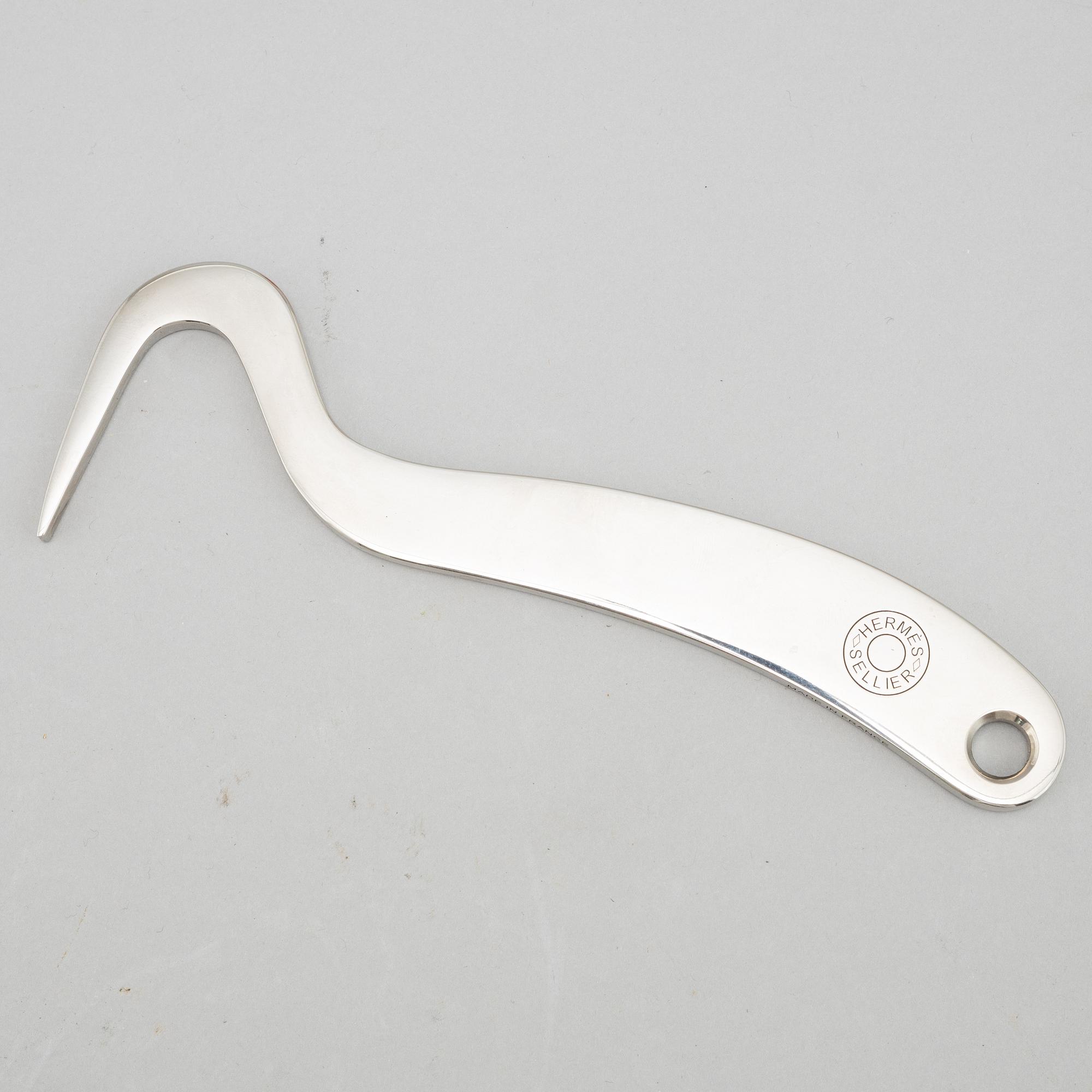 Hermès, hoof pick.
