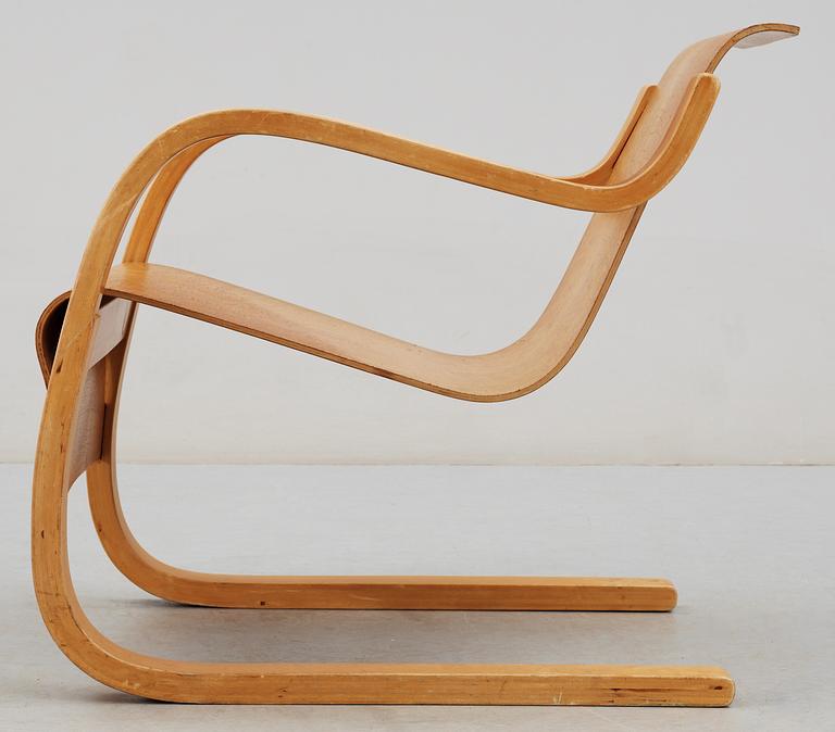 An Alvar Aalto birch armchair by O.y Huonekalu-ja Rakennustyötehdas A.B,