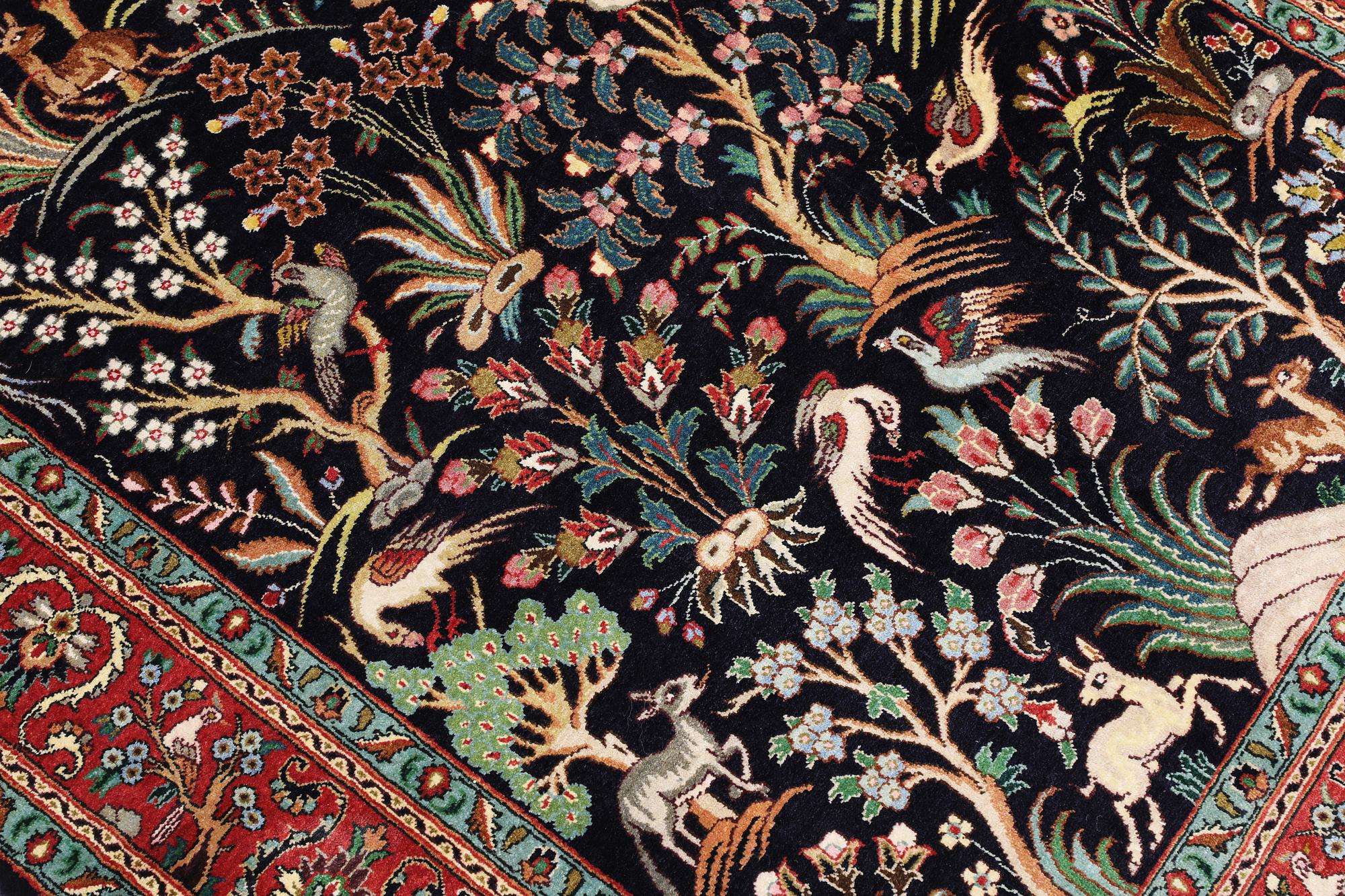 A Tabriz silk rug, approx. 155 x 100 cm.