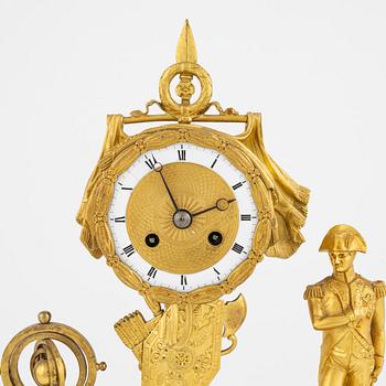 A French Empire ormolu figural mantel clock, early 19th century.