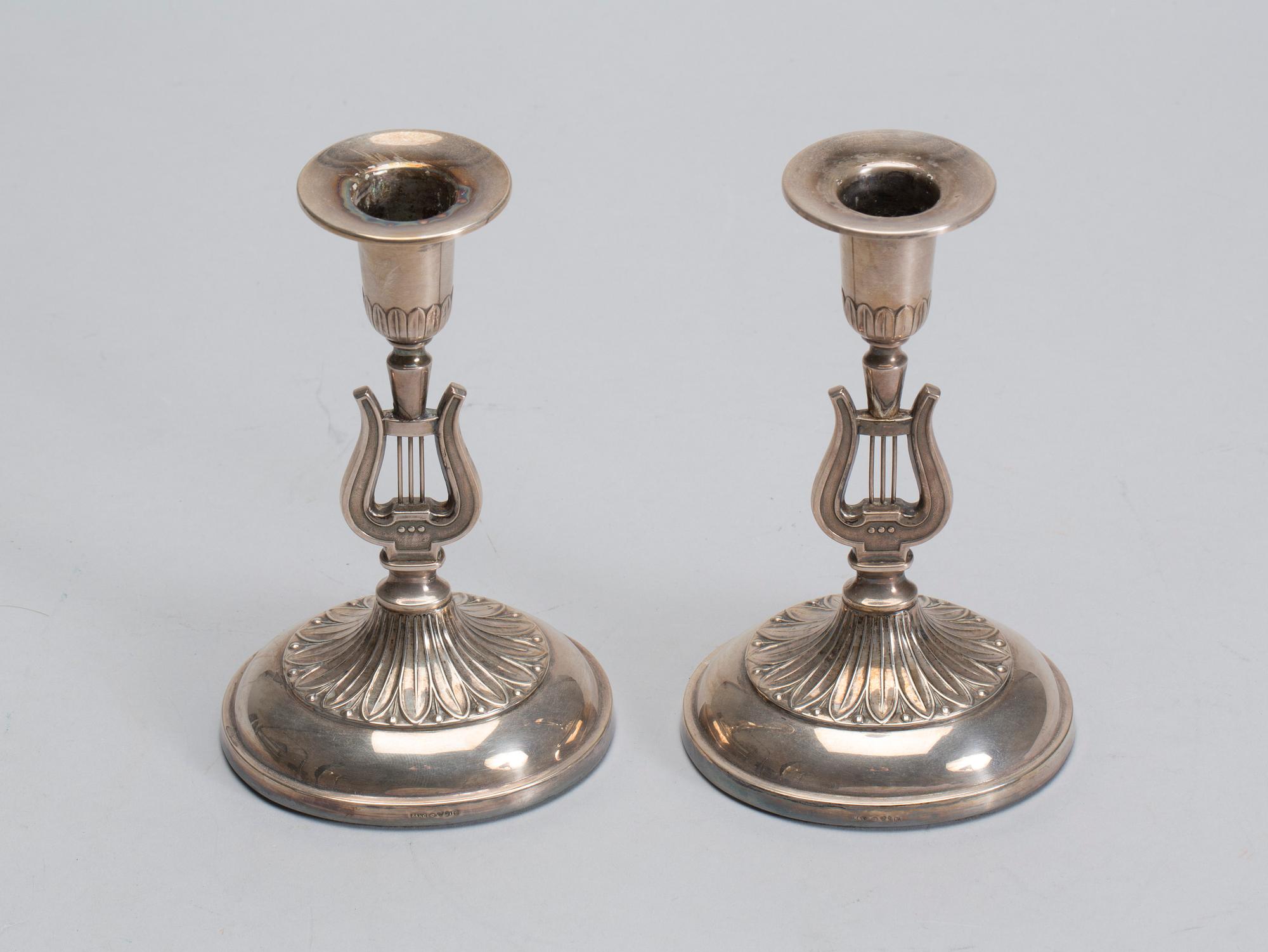 LJUSSTAKAR, ett par, silver, 1900-talets mitt.