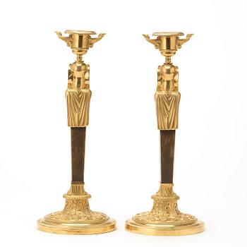 A pair of Empire circa 1810 candlesticks.