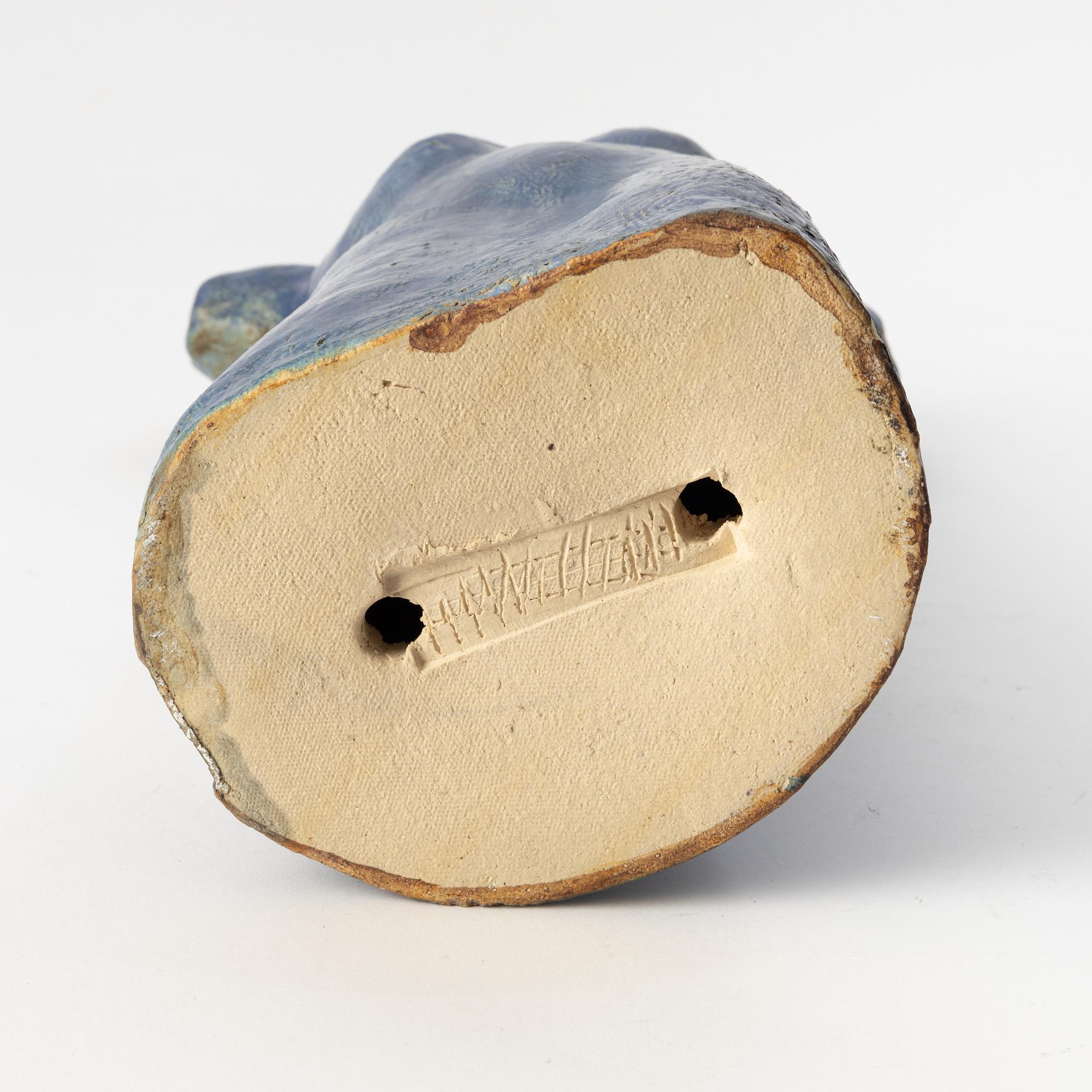 Kjell Janson, a stoneware sculpture of a torso, signed.