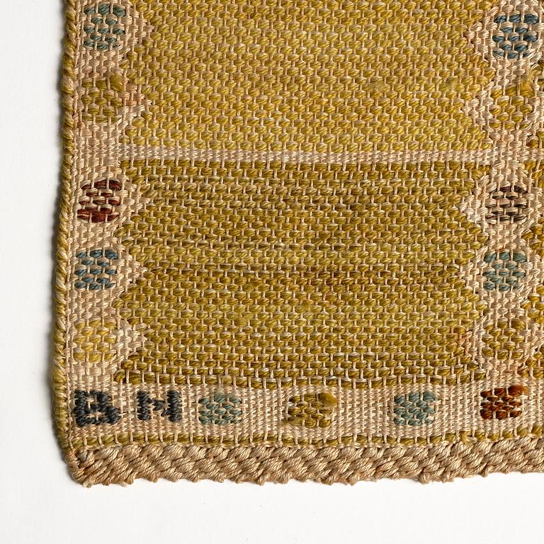Barbro Nilsson, a 'Kvadrater på linne, gul' textile, flat weave, c 84 x 26 cm, signed BN.