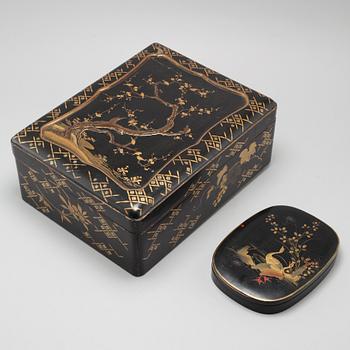 Two Japanese lacquered boxes with covers, circa 1900.