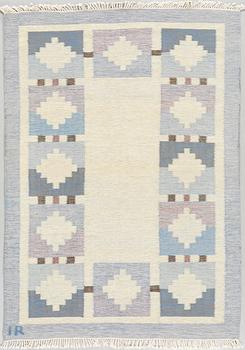 A flat weave carpet designed by Ida Rydelius from the second half of the 20th century.