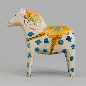 a swedish wooden Dala horse from the first half of the 20th century.