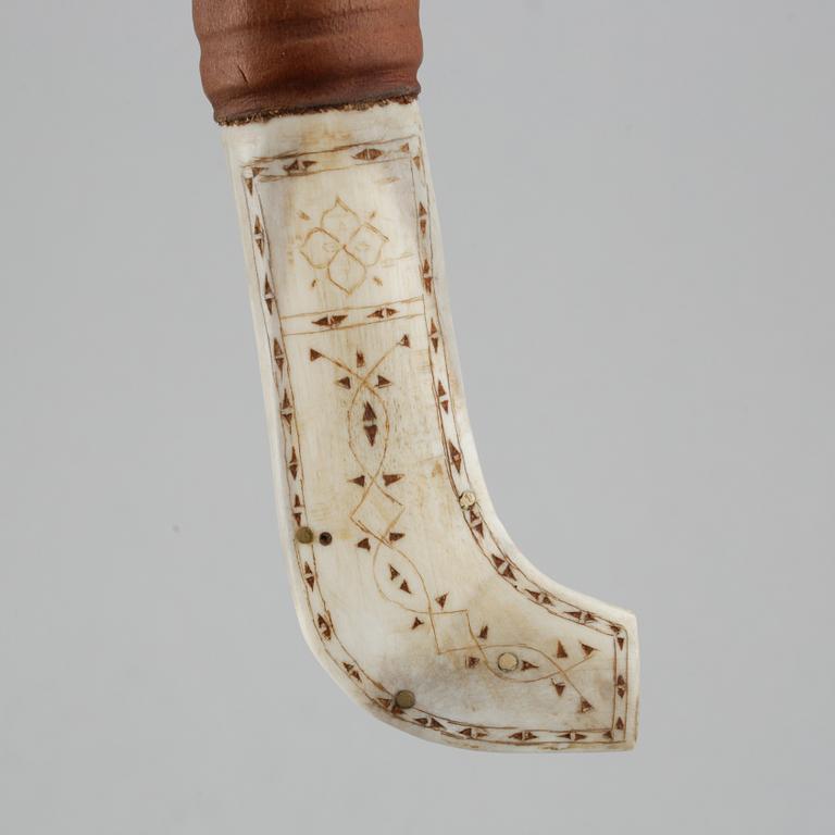 A Sami reindeer horn knife, unidentified signature.