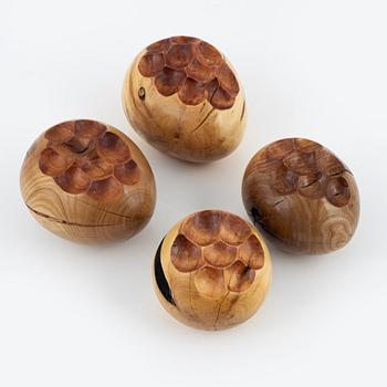 Magnus Ek, a set of four wooden appetize holders for Oaxen Krog.