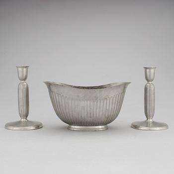 One pewter bowl and a pair of candleholders by Just Andersen, Denmark.