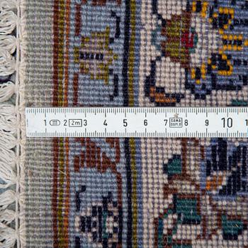 A carpet, an old Kashan, ca 554,5 x 351,5-358 cm, an inscription: Kashan Tavasoli.