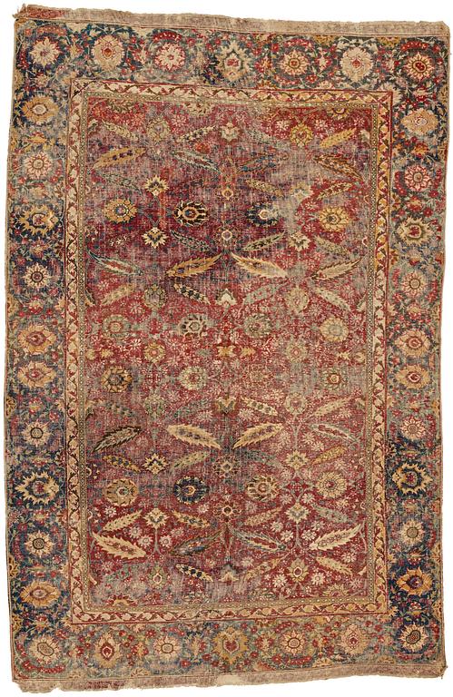 A MUGHAL RUG, an antique Indian, the second half of the 17th century, ca 191-198,5 x 126,5-127,5 cm.