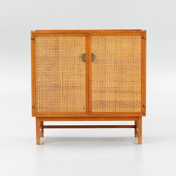 A 'Nizza' mahogany and rattan cabinet, Westbergs, 1953.