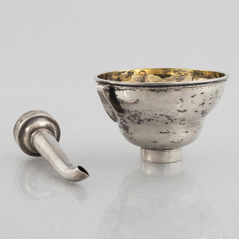 A Swedish parcel-gilt silver wine funnel, mark of Adolf Zethelius, Stockholm 1830.