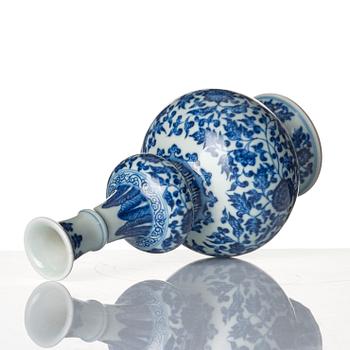 A blue and white gourd shaped lotus vase, presumably Chinese Republic with Qianlong mark.